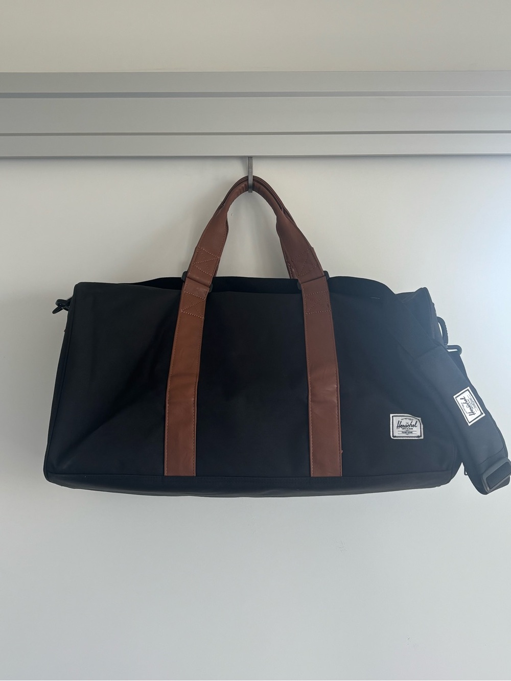 Herschel Supply Company Novel Black Duffel with Brown Handles
